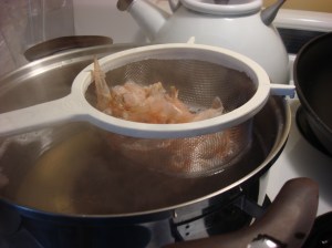 I strain the shrimp broth directly into the pasta pot