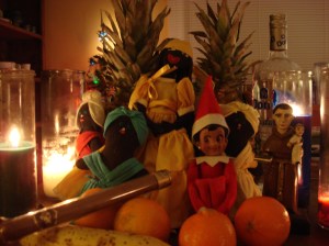 Lucia celebrating sincretization of religions with some of her Cuban friends...Elegguá (as Saint Anthony), Oshún, and Yemayá. Aché!