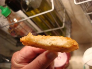 Letting the batter rest gives time for the baking powder to activate. that will give you nice airiness in the fritters.