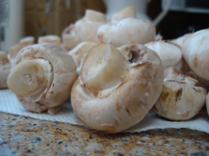 When buying mushrooms, look for the area under the cap to be closed. That says freshness.
