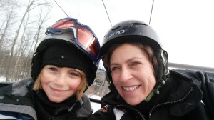 Yes, it is many degrees below zero and we are on a ski lift...am I smiling or grimacing? 